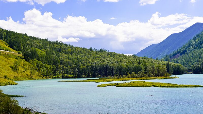 Explore_the_Breathtaking_Views_of_Wolong_Bay_in_Kanas__Xinjiang video poster