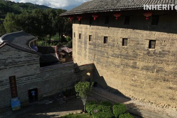 Harmony in Stone and Earth: The Timeless Craft of Tulou Construction Harmony_in_Stone_and_Earth__The_Timeless_Craft_of_Tulou_Construction