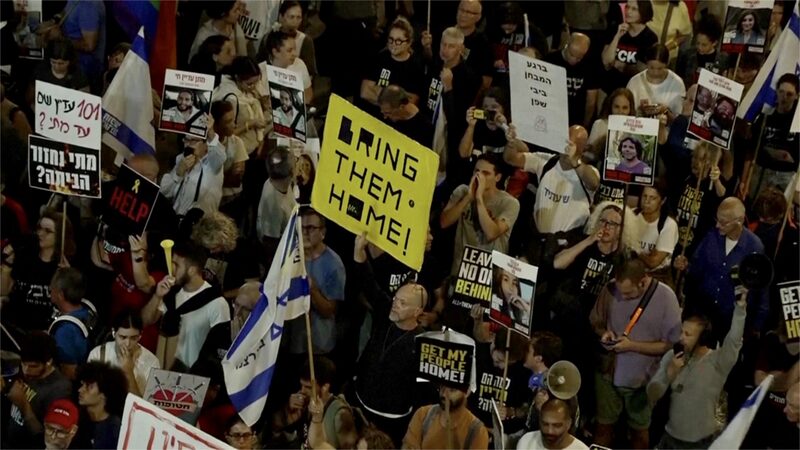 Thousands Protest in Tel Aviv, Urging Israeli Government to Secure Hostage Release from Gaza Thousands_Protest_in_Tel_Aviv__Urging_Israeli_Government_to_Secure_Hostage_Release_from_Gaza video poster