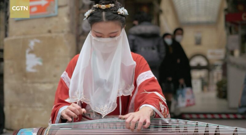 Young_Chinese_Musician_s_Guzheng_Performances_Captivate_Paris_Streets_poster - My Global News: Voices of a New Era Young_Chinese_Musician_s_Guzheng_Performances_Captivate_Paris_Streets video poster