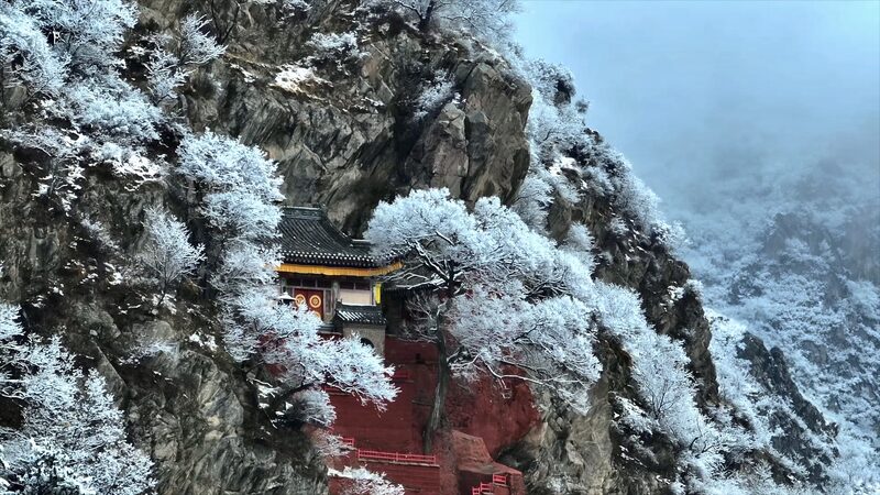 Mount_Wutai_Shimmers_in_White_After_Spring_Snowfall video poster