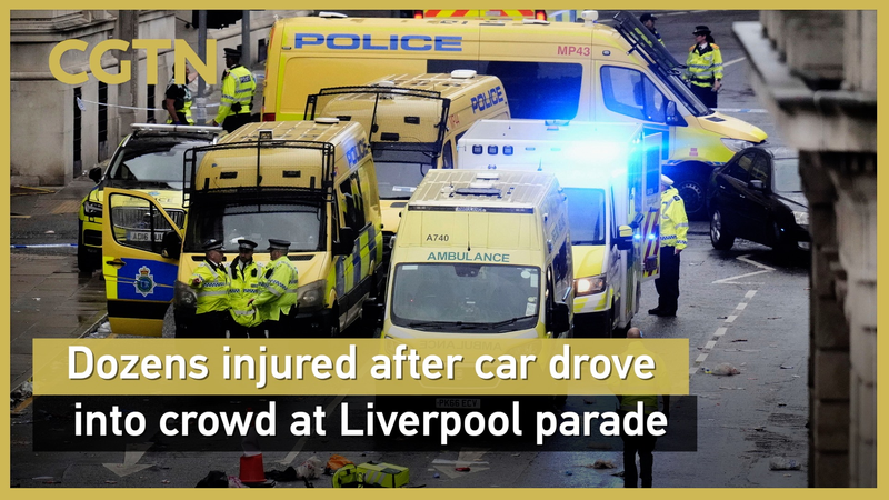 Dozens Injured as Car Crashes into Crowd at Liverpool Victory Parade Dozens_Injured_as_Car_Crashes_into_Crowd_at_Liverpool_Victory_Parade video poster