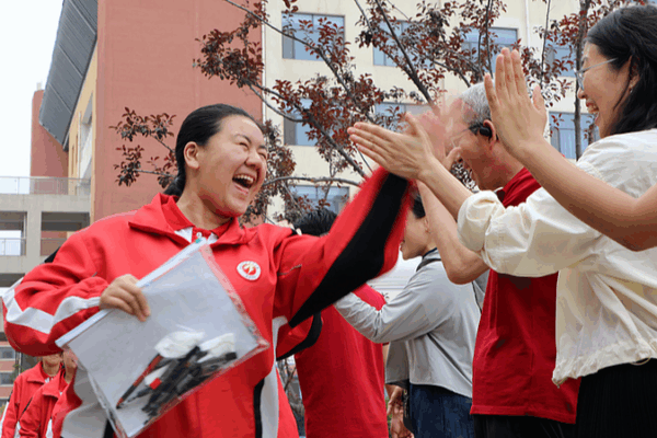 Gaokao 2025 Day 1: Red Ribbons, Sunflowers & Community Spirit Gaokao_2025_Day_1__Red_Ribbons__Sunflowers___Community_Spirit