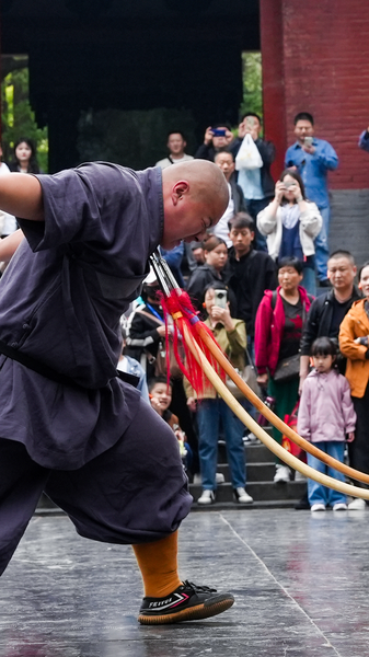 Shaolin_s_Spear_Throat_Stunt_Showcases_Controlled_Strength video poster