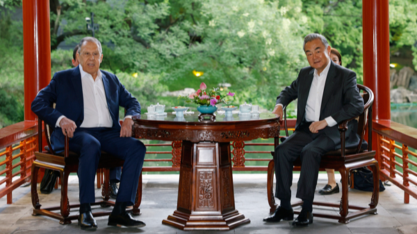Wang Yi, Lavrov Cement Sino-Russian Unity Amid Global Turmoil Wang_Yi__Lavrov_Cement_Sino_Russian_Unity_Amid_Global_Turmoil