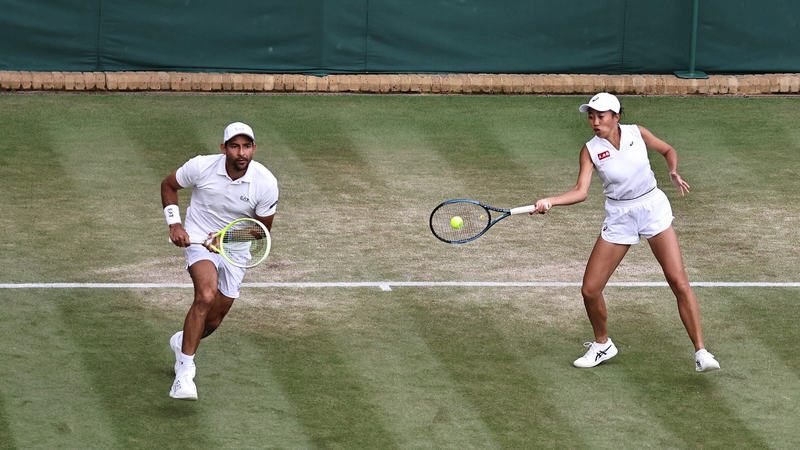 Zhang_Shuai_Advances_to_Wimbledon_Mixed_Doubles_Quarterfinal__Exits_Women_s_Doubles