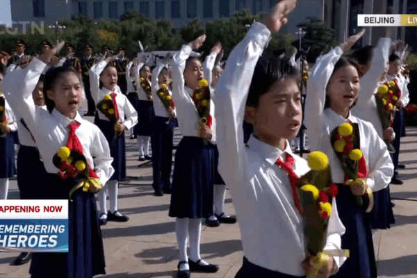Young Voices at Martyrs’ Day: Children Sing at Tiananmen Square Young Voices at Martyrs’ Day: Children Sing at Tiananmen Square video poster