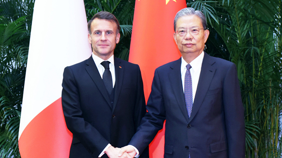 China’s Top Legislator Zhao Leji Meets President Macron in Beijing