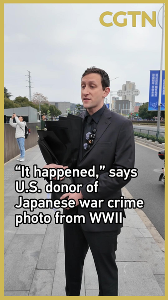 Evan_Kail_Calls_for_Japanese_Apology_at_Nanjing_Memorial_Day video poster