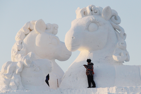 Harbin’s 10m ‘Pony Family’ Snow Sculpture Celebrates Year of the Horse